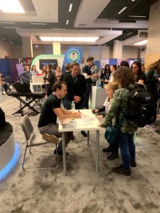 Mrs. Doubtfire star Rob McClure signs autographs at the Harmony Helper booth at BroadwayCon 2020
