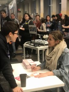 Mean Girls starTaylor Louderman signs autographs at the Harmony Helper booth at BroadwayCon 2020