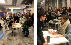 Broadway stars Rob McClure and Taylor Louderman sign autographs at the Harmony Helper booth at BroadwayCon 2020